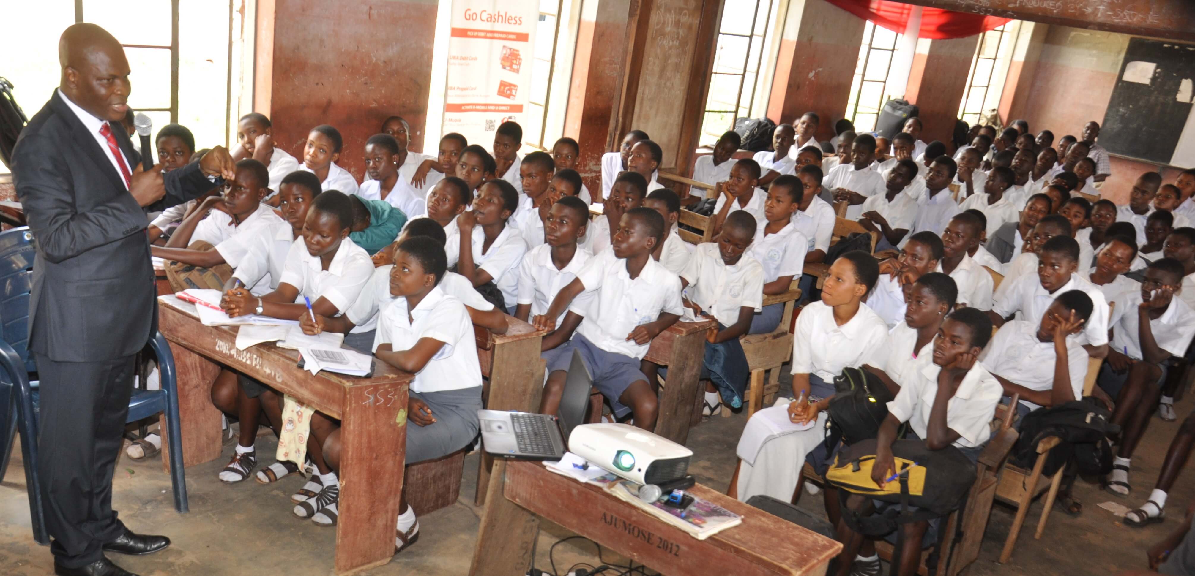 Executive Director, Lagos and West Bank, United Bank for Africa, Mr. Liadi Ayoku teaching at the Olivet Baptist High School , Oyo, during the financial literacy training programme for students, an initiative of Central Bank of Nigeria, in commemoration of World Savings Day on Monday in Oyo, Oyo State