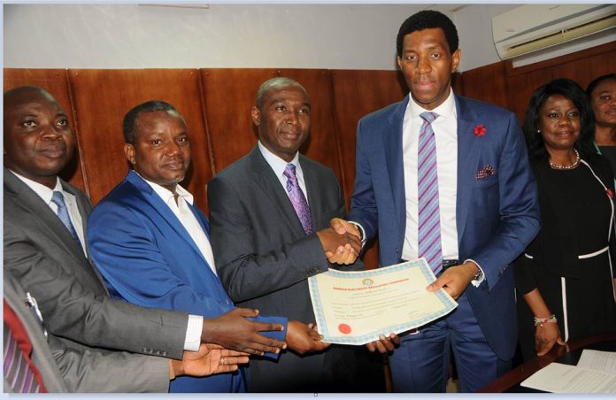SPDC JV’s Afam VI power plant secures licence for another 10 years ABUJA, FCT, November 21, 2017/-- The Nigeria Electricity Regulatory Commission has renewed the power generation licence for Afam VI Power Plant, a 650MW-capacity facility that has delivered over 24.16 million Megawatt-hour (MWh) of electricity into the Nigerian grid between inception in 2008 and 2016. Afam VI is owned by The Shell Petroleum Development Company Joint Venture (SPDC JV) and located in Okoloma in Oyigbo Local Government area of Rivers State. Presenting the renewed licence to the leadership of SPDC at the Commission’s office in Abuja on Tuesday, the Commissioner, Legal, Licensing and Compliance, Mr. Dafe Akpeneye, described SPDC JV as a committed partner in the Nigerian power sector adding that the company’s belief in the sector and its resolve to help it develop were remarkable. “We hope for greater efficiency and improved operations from Afam VI in the next 10-year phase of your operations just as we look forward to working together to resolve some of the challenging issues in the power sector,” he said. Receiving the licence, the General Manager, Gas of SPDC, Dr. Philip Mshelbila, described the Afam VI as a model worthy of emulation by government and other players in the power sector. “Here’s a power plant with a dedicated gas plant operating with high uptime generating clean and efficient power from the combined cycle of three gas and one steam turbines.” He lamented the challenges of debt, power evacuation and off-take which he said prevented the plant from delivering optimally at 15 percent of the total national grid-connected electricity. Afam VI uses combined cycle gas turbine technology that burns 40 percent less gas than plants using older open cycle technologies. This also contributes significantly to the reduction of greenhouse gas emissions. In 2016, Afam VI power plant supplied approximately 12% of the nation’s grid-electricity. Built with the most efficient technology in the industry and utilising waste heat energy from the gas turbine exhaust, the plant generates an additional 200MW from the steam turbine without consuming any additional gas, thereby considerably reducing its carbon footprint. As a Clean Development Mechanism (CDM) project under the United Nations Executive Board for Climate Change, Afam VI Power Plant eliminates over 500,000 tons of CO2 emissions per year, while also maintaining excellent safety standards. The operations at Afam VI have generated subcontract opportunities and employment for over 150 staff from the 16 host communities. It also provided hands-on and offshore training for 15 youths in Electrical, Mechanical and Instrumentation engineering on Combined Cycle Power Plant operations and maintenance. All the trainees are already employed in the Nigerian power industry. Arrangements have been concluded for the training of another 15 community youths. The power plant also won SPDC the Best Company in Climate Action Award in the 2016 edition of Sustainability, Enterprise, Responsibility Awards for Corporate Social Responsibility (SERAs–CSR), an annual event to celebrate organisations that invest resources to improve the socioeconomic living conditions of people in Nigeria and Africa. SPDC JV’s Afam VI Power Plant Secures Licence for Another 10 years