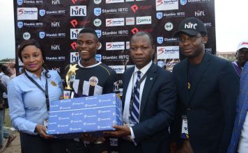 L-R: Acting Head, Marketing and Communications, Stanbic IBTC, Mrs Bridget Oyefeso-Odusami; Most Valuable Player, Robert Odu of Unilag Marines; Executive Director, Operations, Stanbic IBTC, Wole Adeniyi; and Director, Pace Sport & Entertainment Marketing, Sola Fijabi, at the presentation of MVP award to Odu after the Unilag-Uniben match in the Stanbic IBTC-sponsored varsity football league competition, on Wednesday