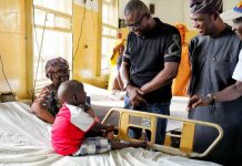 Sanwo-Olu Visits Collapsed Building Site, Meets Victims At Hospitals Lagos State Governor-Elect, Mr. Babajide Olusola Sanwo-Olu and his Deputy Governor-Elect, Dr. Kadir Obafemi Hamzat, charting with one of the pupils of Collapsed Building, during their visit to the Lagos General Hospital, in Lagos