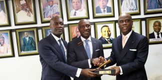 L-R: Roosevelt Ogbonna, Deputy Group Managing Director, Access Bank Plc.; Oscar N. Onyema, Chief Executive Officer, Nigerian Stock Exchange (NSE); Herbert Wigwe, Group Managing Director, Access Bank Plc, at the NSE listing of Access Bank Plc. N15 billion Green Bond.