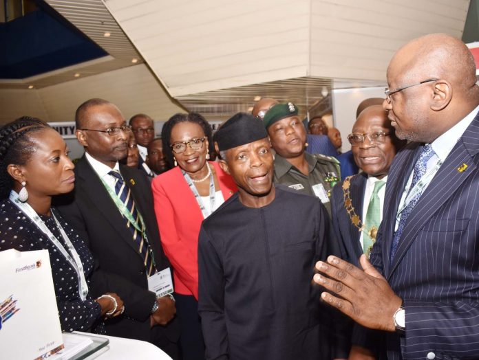 Professor Yemi Osinbajo, Vice President, Federal Republic of Nigeria (middle); Dr. Adesola Adeduntan, Chief Executive Officer, First Bank of Nigeria Limited (right); Dr Uche Olowu, President, Chartered Institute of Bankers of Nigeria (second right); Otunba Debola Osibogun, Non-Executive Director, FBN Holdings Plc and former President, Chartered Institute of Bankers of Nigeria (third left); Mr. Abdullahi Ibrahim, Executive Director, Public Sector, First Bank of Nigeria Limited (second left); and Folake Ani-Mumuney, Group Head, Marketing & Corporate Communications, First Bank of Nigeria Limited (left) at the CIBN 12th Annual Banking and Finance Conference held in Abuja Professor Yemi Osinbajo, Vice President, Federal Republic of Nigeria (middle); Dr. Adesola Adeduntan, Chief Executive Officer, First Bank of Nigeria Limited (right); Dr Uche Olowu, President, Chartered Institute of Bankers of Nigeria (second right); Otunba Debola Osibogun, Non-Executive Director, FBN Holdings Plc and former President, Chartered Institute of Bankers of Nigeria (third left); Mr. Abdullahi Ibrahim, Executive Director, Public Sector, First Bank of Nigeria Limited (second left); and Folake Ani-Mumuney, Group Head, Marketing & Corporate Communications, First Bank of Nigeria Limited (left) at the CIBN 12th Annual Banking and Finance Conference held in Abuja