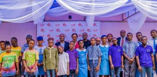 Executive Director, United Bank for Africa(UBA) Plc, Mr. Ayoku Liadi; CEO, UBA Foundation, Mrs. Bola Atta; Head, Brand Management, UBA Plc, Mr. Lashe Osoba, flanked by students of various schools during the 2nd edition of UBA Foundation’s ‘Each One, Teach One’ initiative where UBA Staff teach and assist the less privileged, especially students and people living with disabilities across Africa, held in Lagos on Friday.