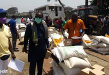 Sanwo-olu Gives Pallatives To Lagos boat Operators, Tarzan gives Sanitizers Gani Tarzan Balogun, CEO, Tarzan Boats, with LASWA General Manager, Damilola Emmanuel, at the palliatives handover.